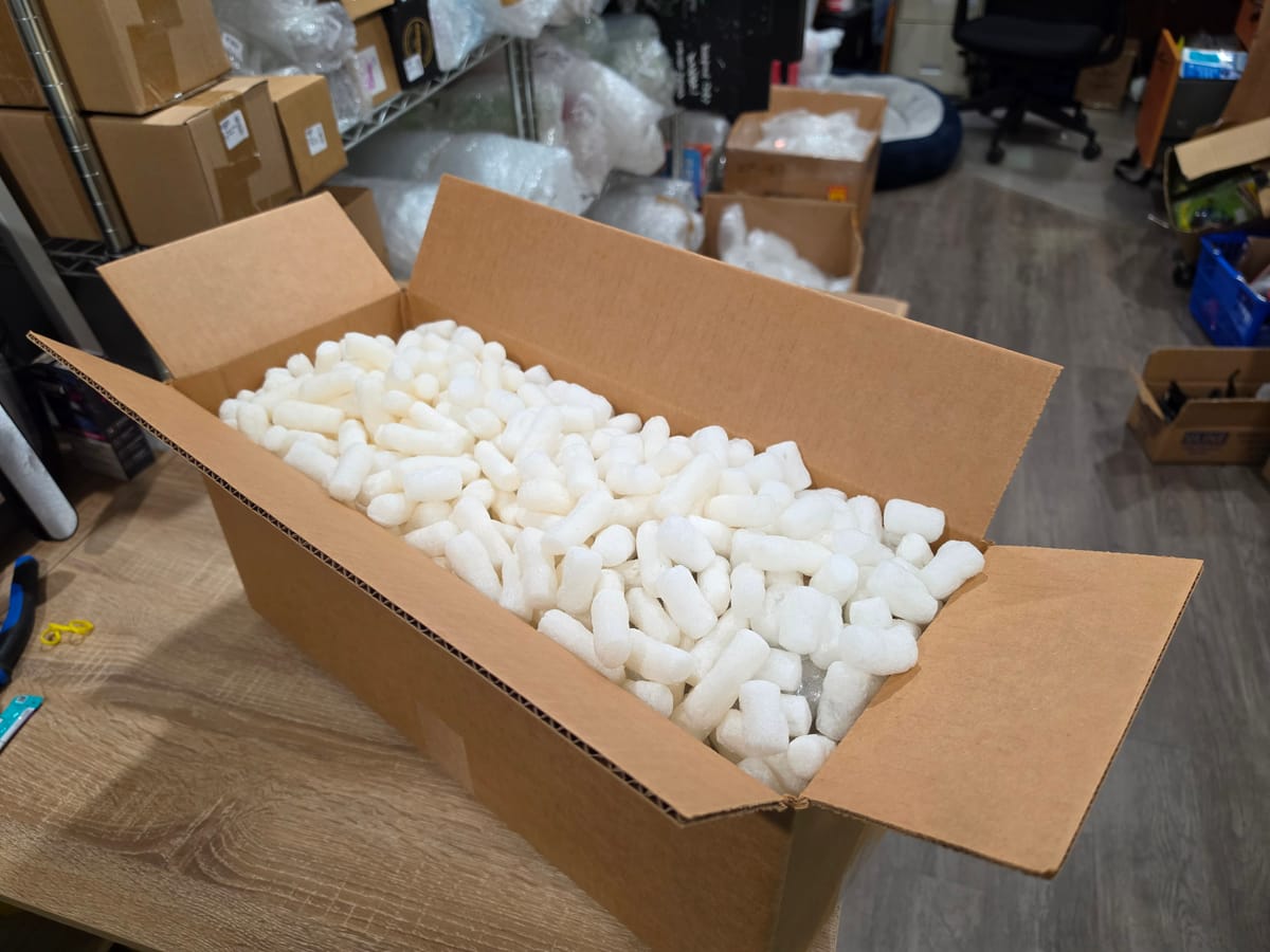 Photo of the Boxed + filled step in how we pack glass for shipping.